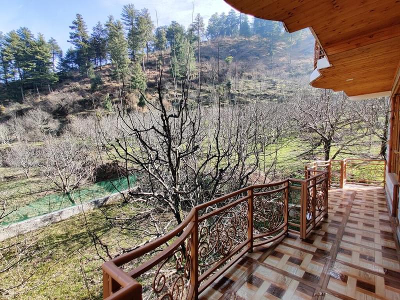 A Riverside Cottage Stay Amidst Lush Greenery In Manali Image