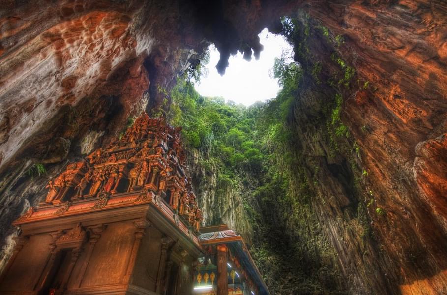 Admire the limestone rock formations at the Batu Caves