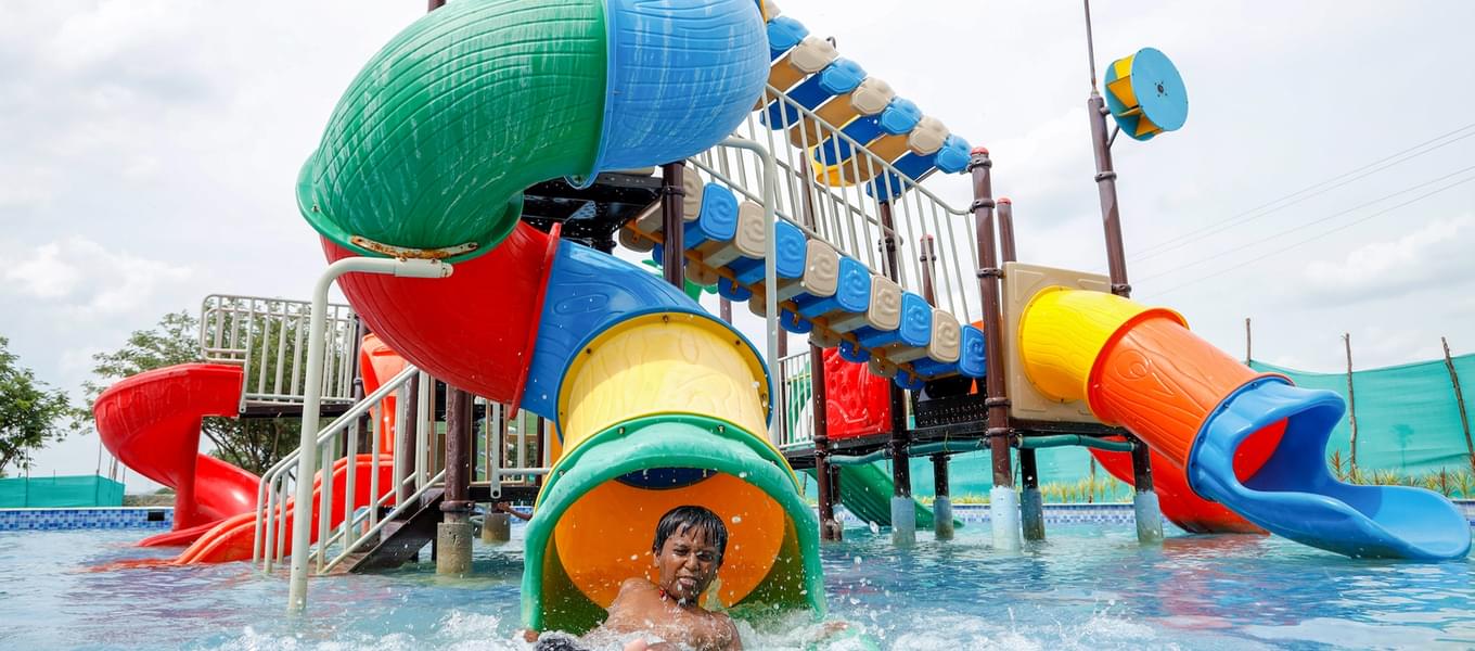 Enjoy fun water slides with your companions.