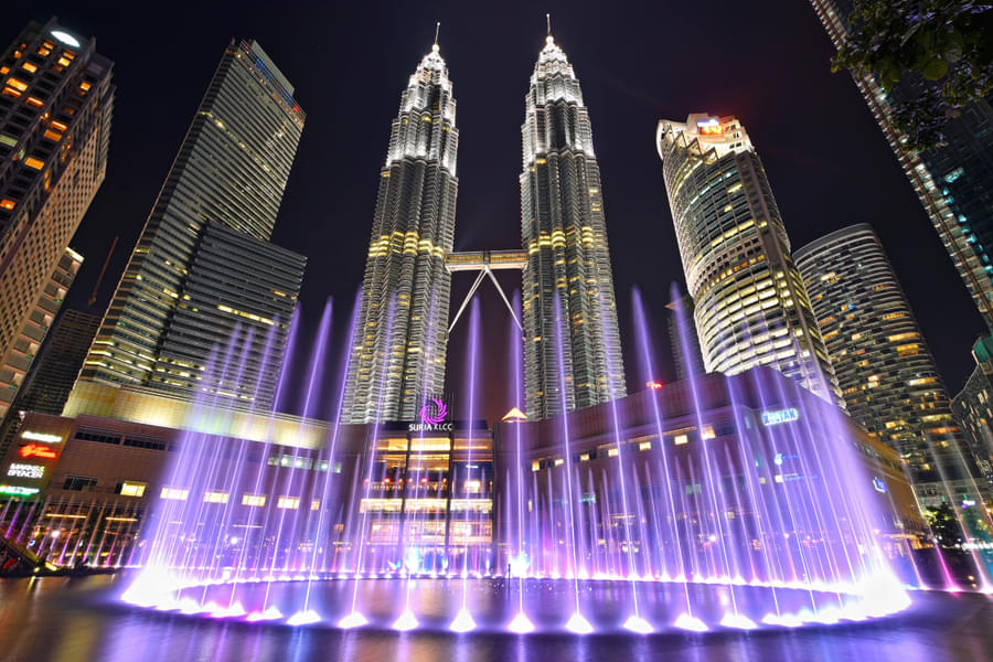 Admire the Petronas Twin Towers Kuala Lumpur with lighting show.