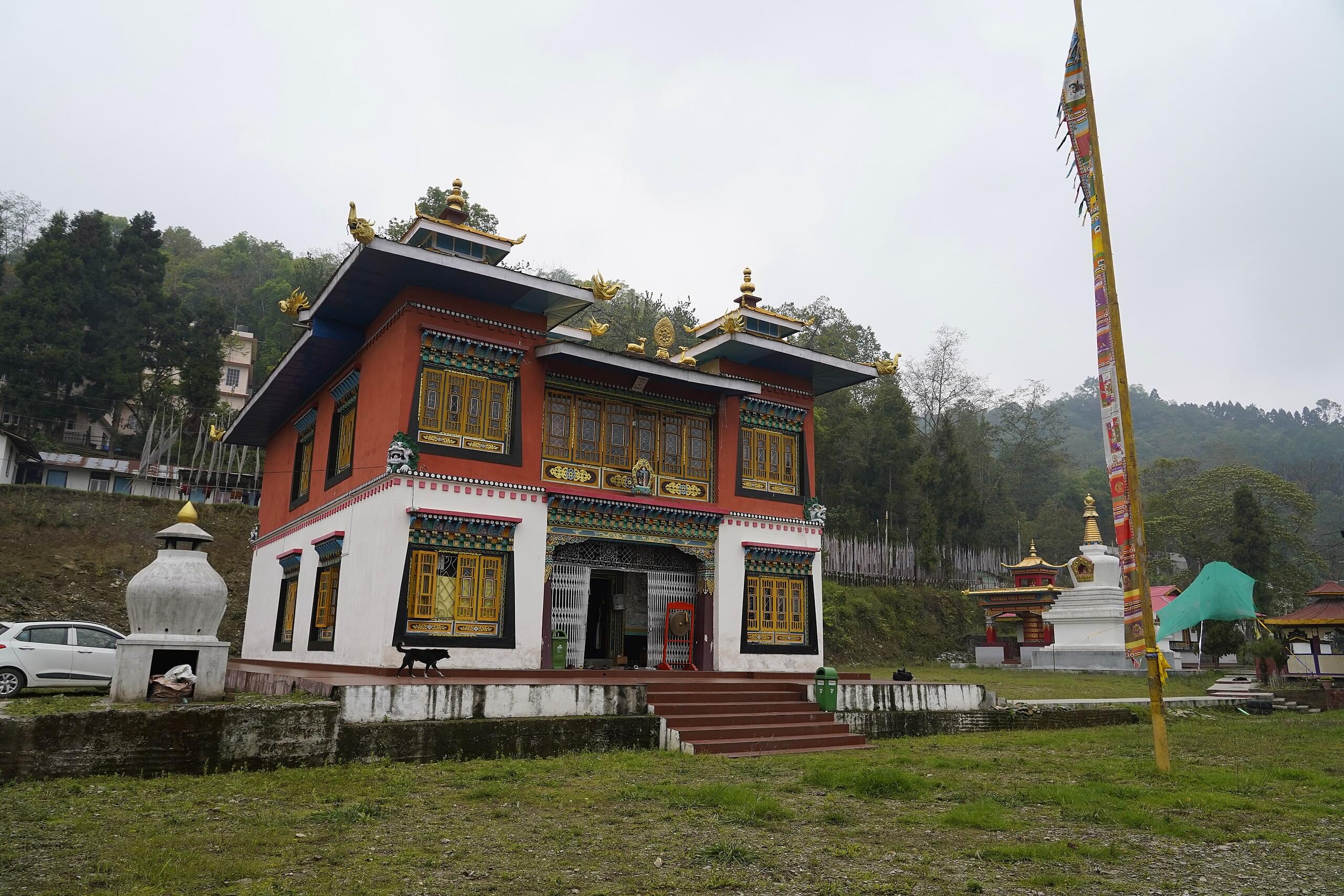 Admire the Norbugang Coronation Throne & Chorten