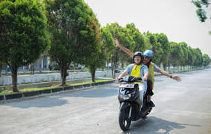Feel the thrill of riding on open roads with your scooty rental