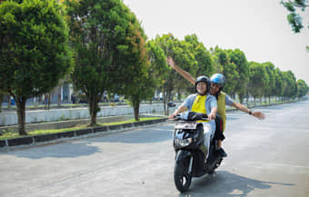 Feel the thrill of riding on open roads with your scooty rental