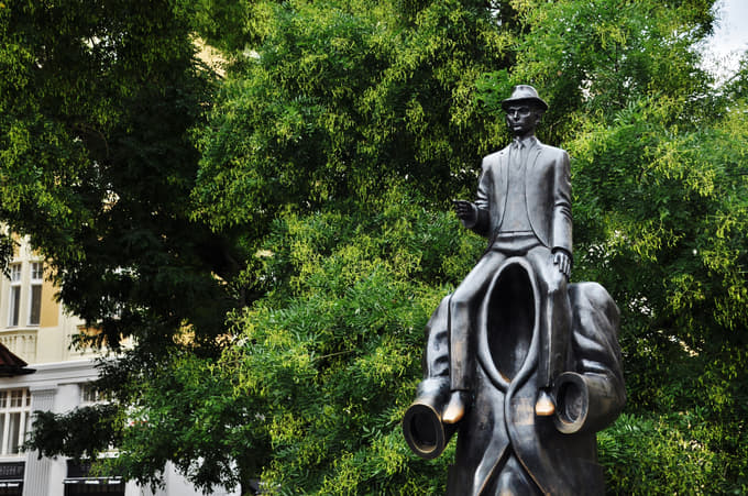 See the famous statue of Franz Kafka