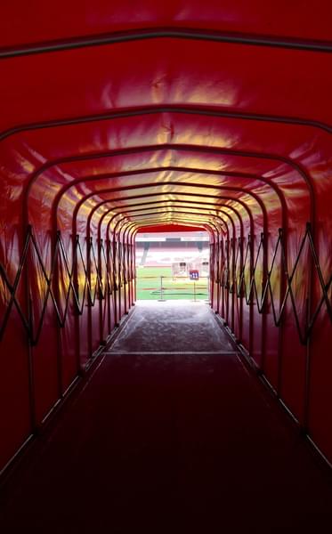 Reach the stadium by passing through the Players' Tunnel