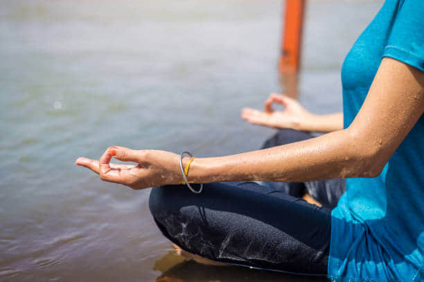 Experience Morning Yoga by the Ganges