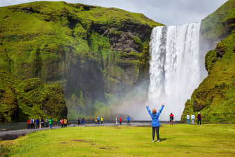Tourist at Skogafoss Waterfall