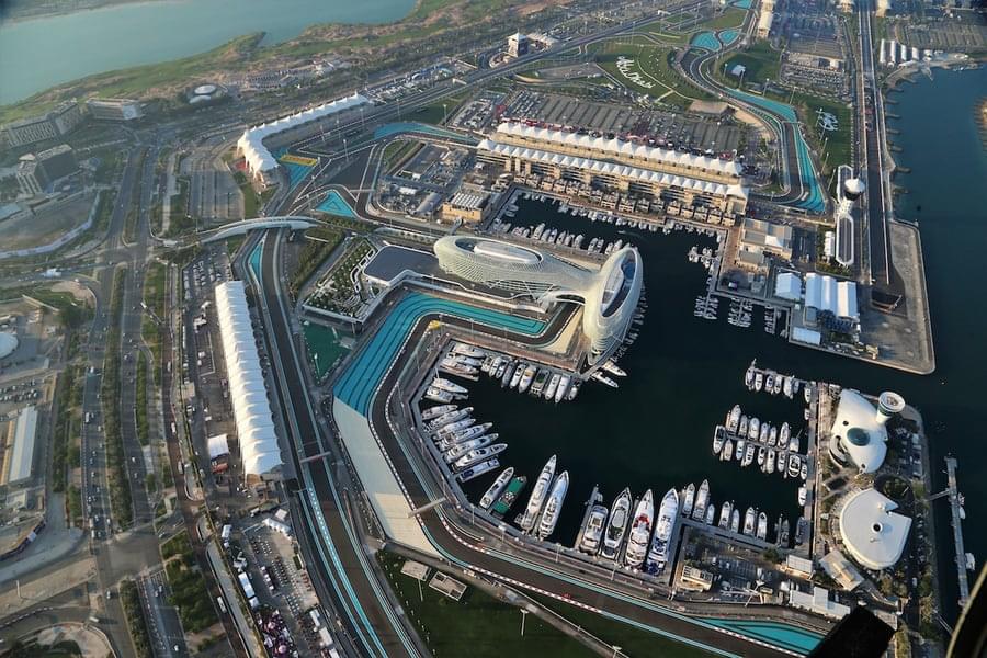 Feel the excitement as you cruise past the iconic Yas Marina Circuit