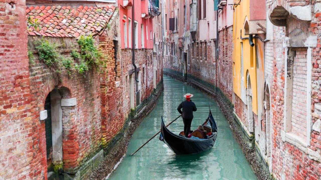 Capture the scenic view from Gondola, Venice