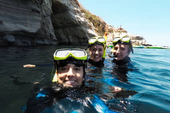 Go snorkeling and see the vibrant marine life of Seven Sea Caves up close