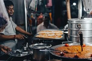 Learn about the authentic dishes of Kochi and their significance in the city's culinary heritage from your guide