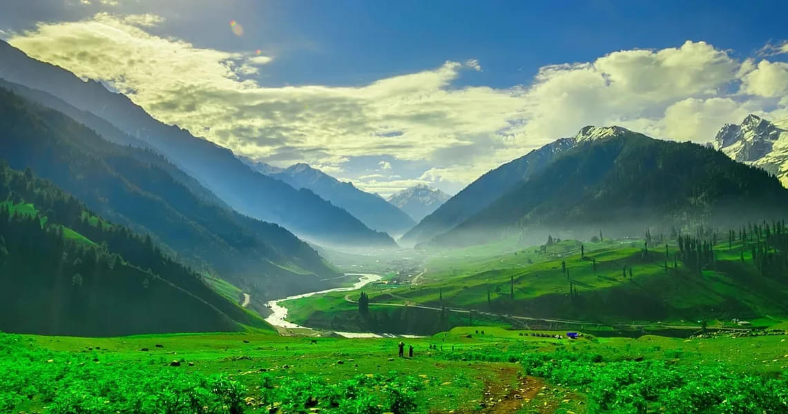 Admire the cultural richness of Kashmir, the land of snow-capped peaks, serene lakes, and vibrant traditions