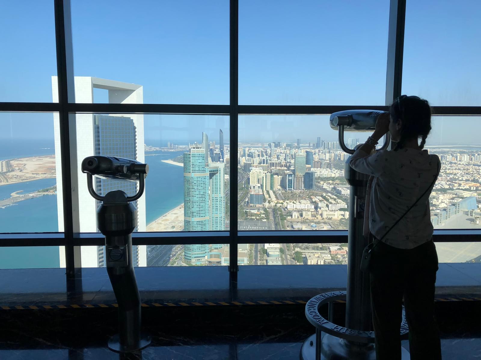Use the telescopes to see Corniche and the Arabian Gulf